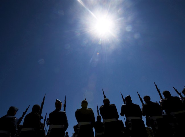 A Canadian military honour guard take part in a ceremony at the Canadian Forces Base Borden Centennial in Angus, Ont., on Thursday, June 9, 2016.