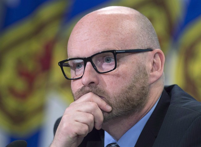 File - Nova Scotia Auditor General Michael Pickup listens to a question during a news conference regarding his latest report in Halifax on Wednesday, June 8, 2016.
