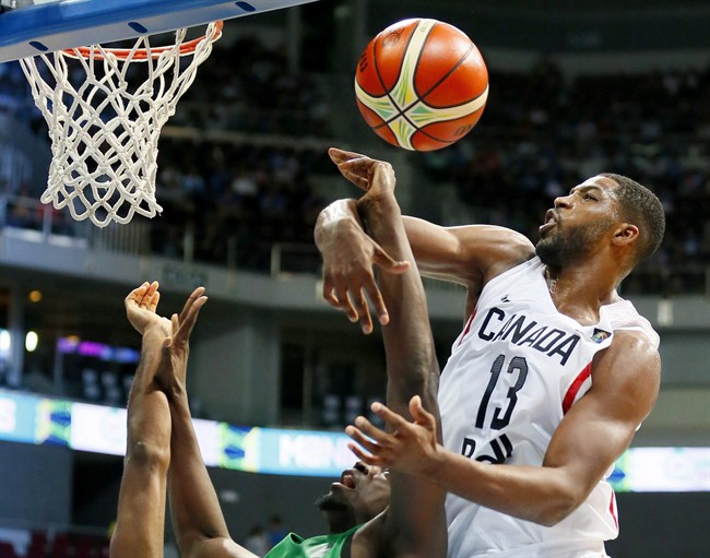 FILE: Canada's Tristan Thompson, right, blocks a shot by Senegal's Cheikh Mbodj during the Group A FIBA Olympic Qualifying basketball match in suburban Pasay city south of Manila, Philippines, on July 6, 2016. Canada will be playing in Halifax the first qualifying round against Bahamas in November 2017 for the FIBA Basketball World Cup 2019 Americas Qualifiers.