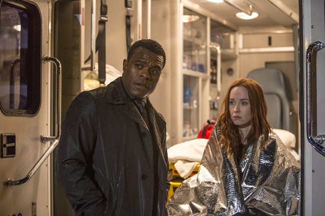 Actors Lyriq Bent and Elyse Levesque (right) are shown in a scene from the television show "Shoot The Messenger." A co-creator of the new CBC-TV crime drama "Shoot the Messenger" insists it's not a story about Rob Ford. 