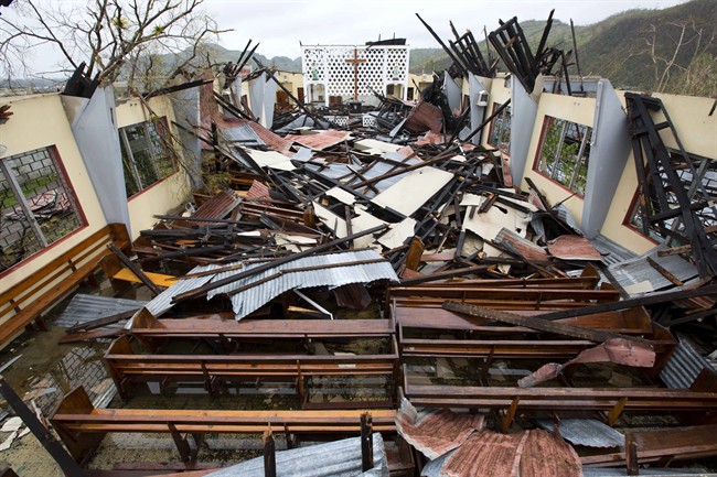 Saint Anne church lays totally destroyed by Hurricane Matthew in Camp Perrin, a district of Les Cayes, Haiti, Thursday, Oct. 6, 2016. Two days after the storm rampaged across the country's remote southwestern peninsula, authorities and aid workers still lack a clear picture of what they fear is the country's biggest disaster in years. (AP Photo/Dieu Nalio Chery)