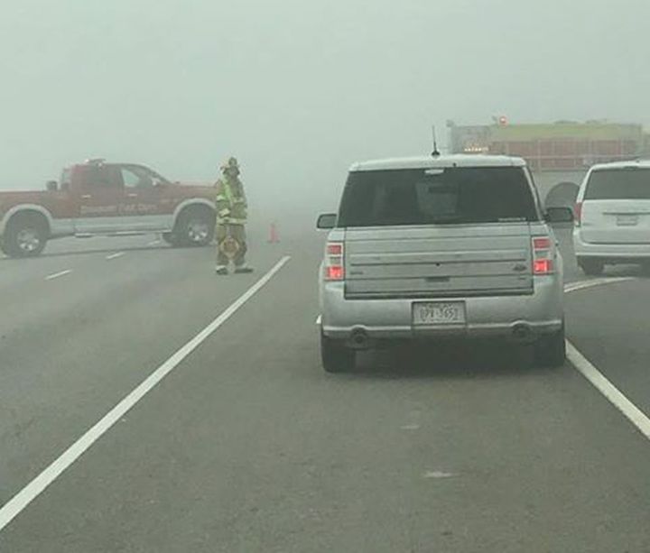 Foggy conditions are seen in this photo of a crash on Alberta Highway 2 Saturday morning.