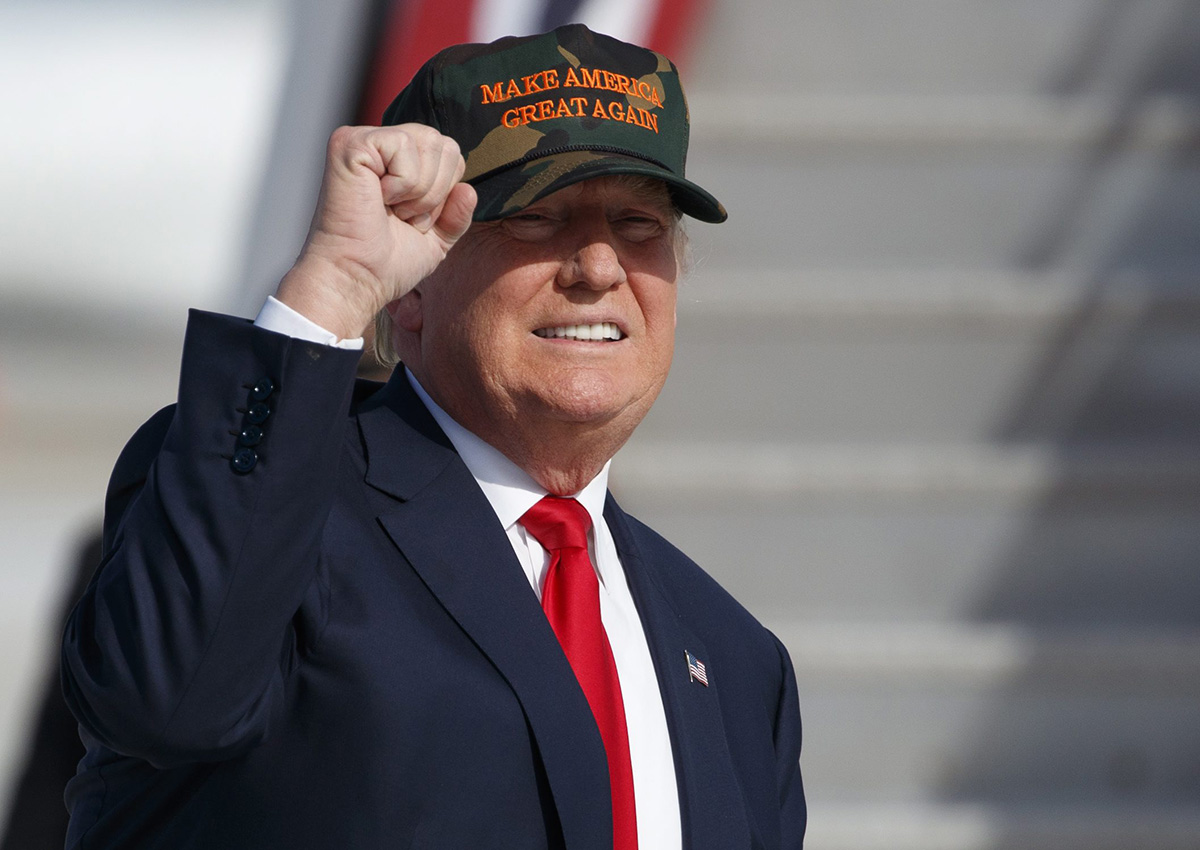 Republican presidential candidate Donald Trump gestures as he arrives to speak to a campaign rally, Tuesday, Oct. 25, 2016, in Sanford, Fla.