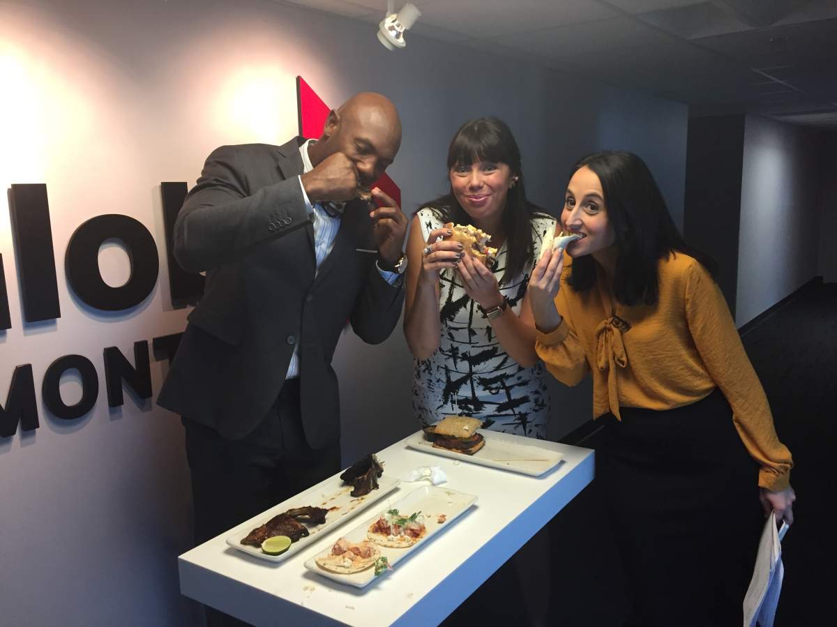 Guest host Kyries Hebert, anchor Laura Casella and weather specialist Kim Sullivan enjoy some food as part of Global News Morning in Montreal, October 7, 2016.