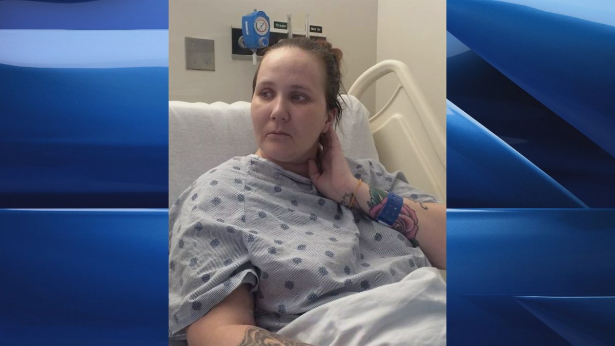 Fliss Cramman is shown in her hospital bed in Dartmouth, N.S., Thursday, Oct.20, 2016. Cramman, a 33-year-old woman facing deportation to the U.K., pleaded Thursday to be allowed to stay in the country she considers home, a day before a hearing that may shed light on her fate.