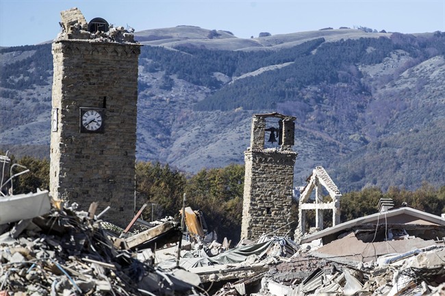 A view of the town of Amatrice, with the bell tower visible at left, after an earthquake with a preliminary magnitude of 6.6 struck central Italy, Sunday, Oct. 30, 2016. 