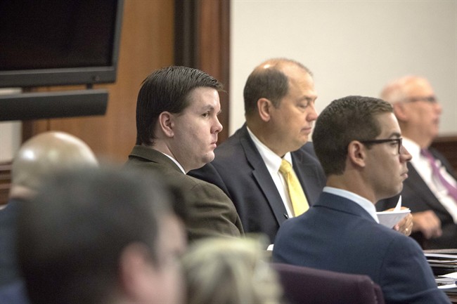Justin Ross Harris, left, listens to opening statements during his trial at the Glynn County Courthouse in Brunswick, Ga., Monday, Oct. 3, 2016.