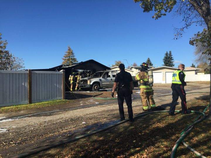 Northeast Edmonton garage fire sends 2 to hospital - image