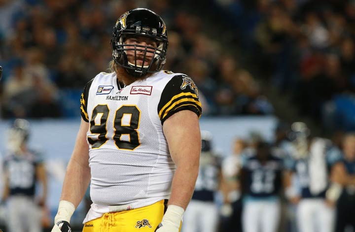 Linden Gaydosh #98 of the Hamilton Tiger-Cats looks on as his team faces the Toronto Argonauts during their game at Rogers Centre on October 10, 2014 in Toronto.