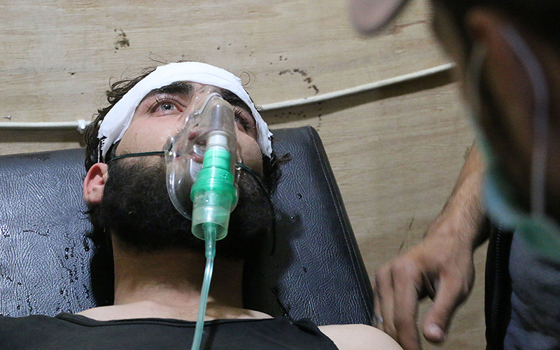 A Syrian man receives treatment at a field hospital following a chlorine gas attack by Assad regime forces in Jobar town of Damascus, Syria on July 30, 2015.