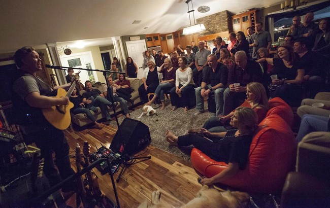 Singer Charlie A'Court, entertains guests at a house party in Hammonds Plains, N.S., on Saturday , Sept. 24, 2016 .