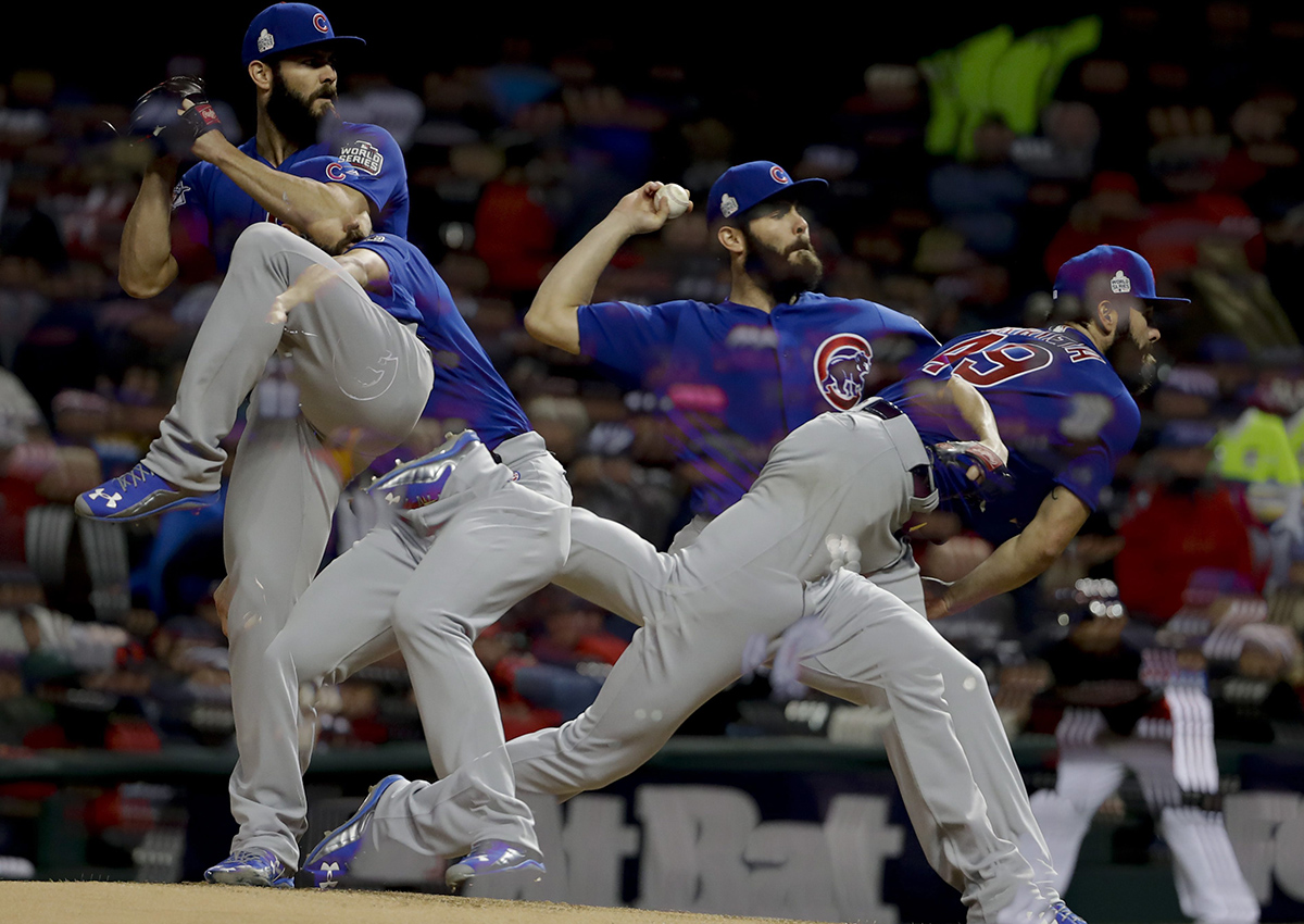 In this multiple exposure picture, Chicago Cubs starting pitcher Jake Arrieta throws against the Cleveland Indians during the fifth inning of Game 2 of the Major League Baseball World Series Wednesday, Oct. 26, 2016, in Cleveland. 