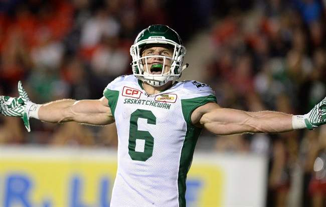 Saskatchewan Roughriders' Rob Bagg (6) reacts after scoring a touchdown against the Ottawa Redblacks during second half CFL action on Friday, Oct. 7, 2016 in Ottawa.