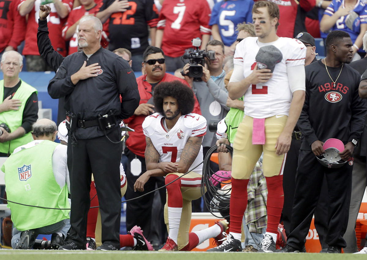 San Francisco 49ers quarterback Colin Kaepernick (7) kneels during the national anthem before an NFL football game against the Buffalo Bills on Sunday, Oct. 16, 2016, in Orchard Park, N.Y.