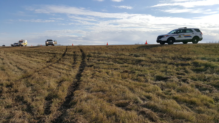 Police are reminding drivers to keep their hands on the wheel and eyes on the road following a rollover on Highway 16 near Lashburn, Sask.