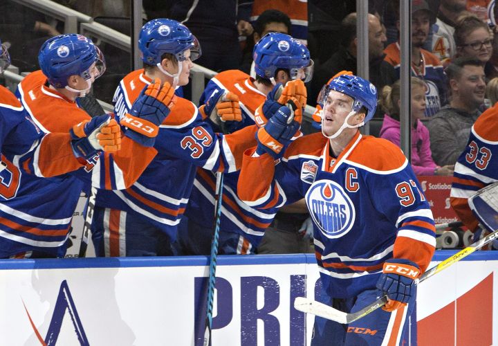 Edmonton Oilers' Connor McDavid (97) celebrates a goal against the Winnipeg Jets during first period NHL pre-season action in Edmonton, Alta., on Thursday October 6, 2016. 