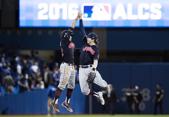 Cleveland Indians shortstop Francisco Lindor, left, and centre fielder Tyler Naquin celebrate after defeating the Toronto Blue Jays in game three of the American League Championship Series baseball action in Toronto on Monday, October 17, 2016.