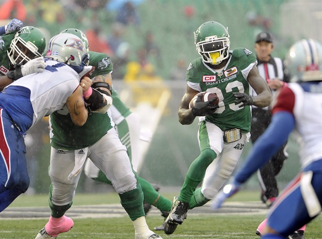 Saskatchewan Roughriders running back Joe McKnight (33) runs the ball during second half CFL action against the Montreal Alouettes, in Regina on Saturday, October 22, 2016. 