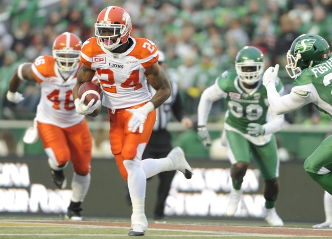B.C. Lions running back Jeremiah Johnson (24) moves the ball up field against the Saskatchewan Roughriders during first half CFL action in Regina on Saturday, Oct. 29, 2016.