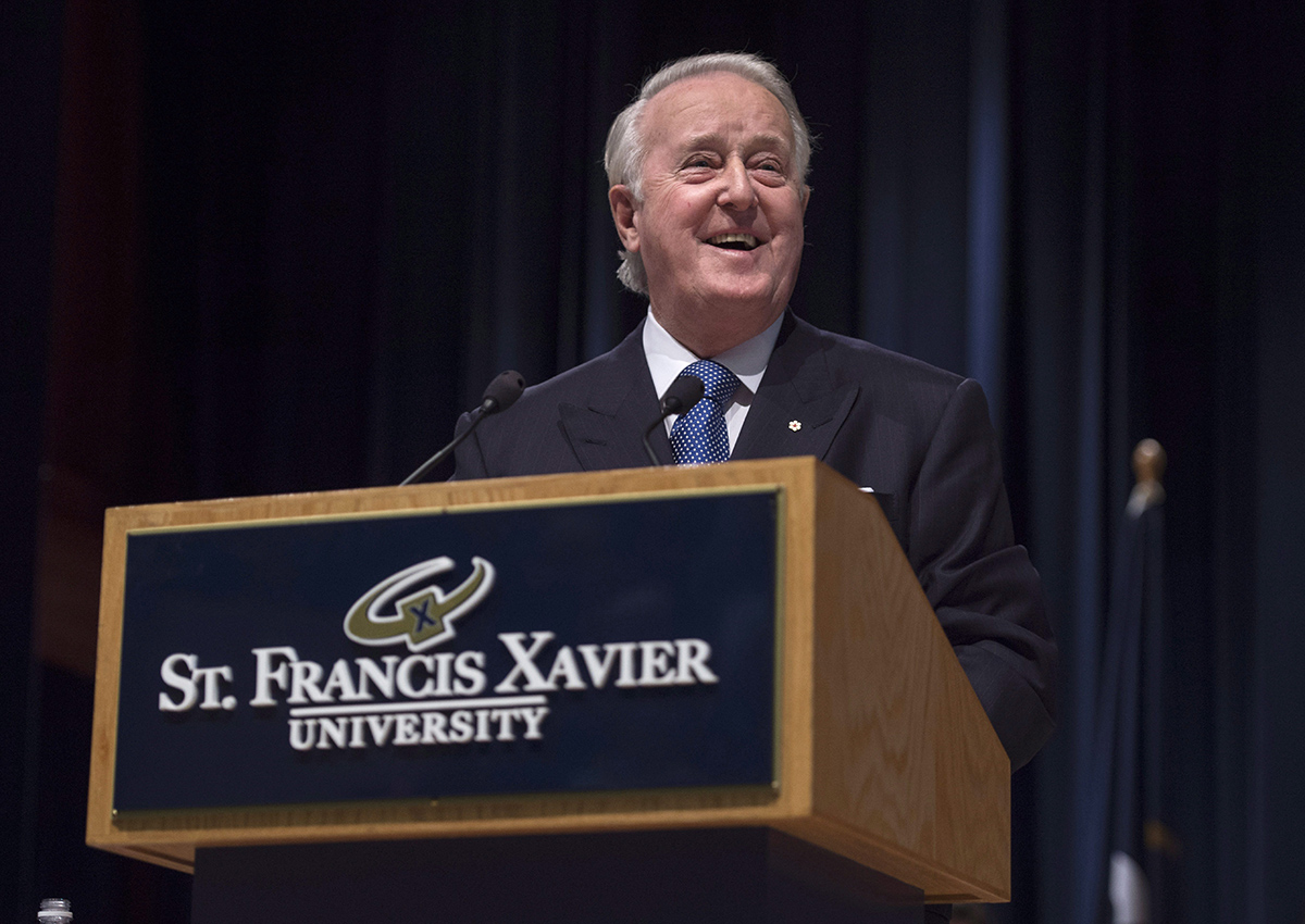 Former Prime Minister Brian Mulroney laughs while speaking following the announcement of the $60 million Brian Mulroney Institute of Government and Mulroney Hall at St. Francis Xavier University in Antigonish, N.S. on Wednesday, October 26, 2016. 