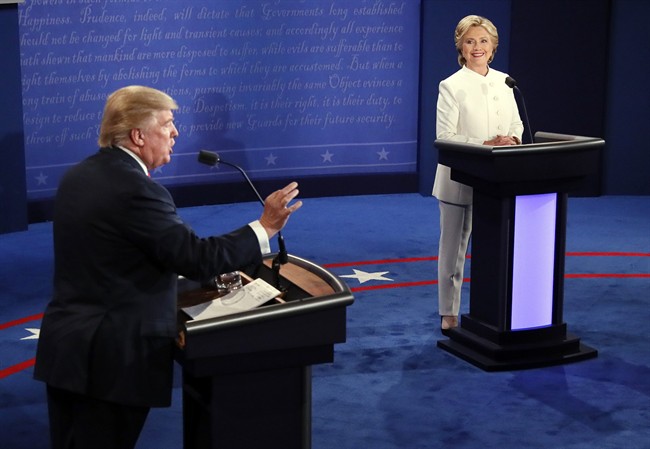 Republican presidential nominee Donald Trump debates Democratic presidential nominee Hillary Clinton.