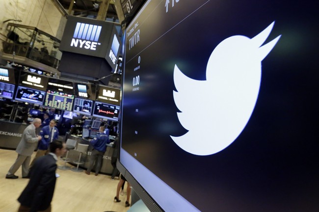 FILE - In this July 27, 2016, file photo, the Twitter symbol appears above a trading post on the floor of the New York Stock Exchange.  (AP Photo/Richard Drew, File).