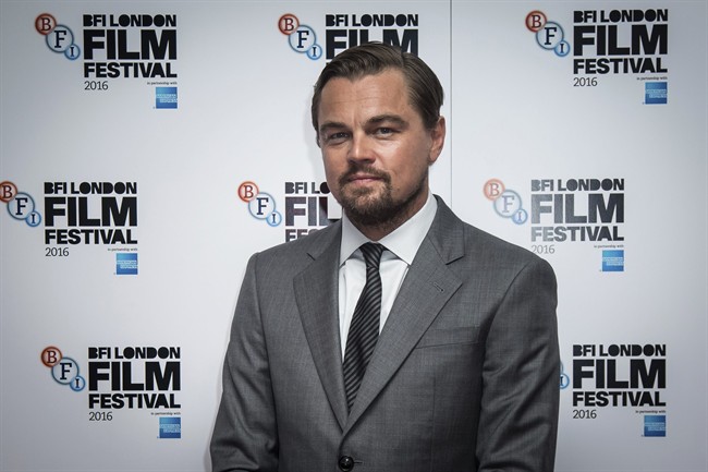 In a Saturday, Oct. 15, 2016 file photo, a ctor Leonardo DiCaprio poses for photographers during a photo call to promote the film 'Before the Flood' which is showing as part of the London Film Festival in London.