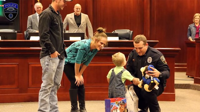 Officer Miller and Brayden, together at a special award ceremony honouring the officer for his quick-thinking.