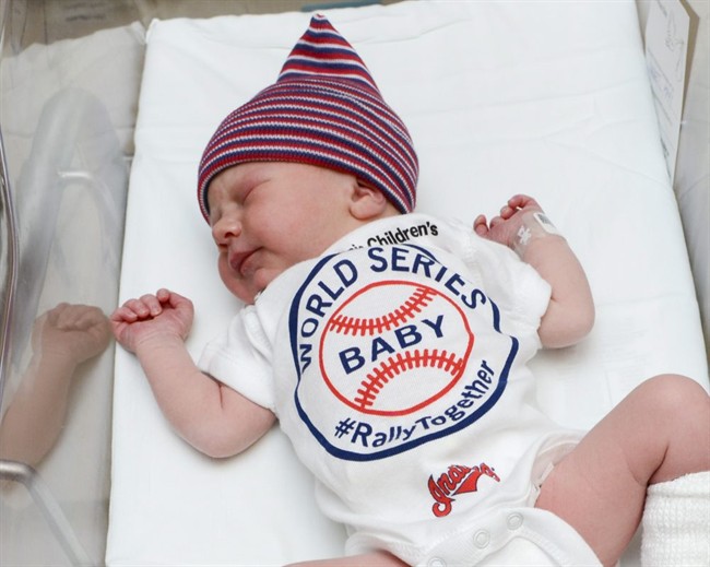 An unidentified baby wears a World Series onesie at the Cleveland Clinic's Fairview Hospital in Cleveland on Tuesday, Oct. 25, 2016.