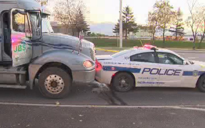 Police investigate a stolen tractor-trailer at McLaughlin Road and Steeles Avenue in Brampton on Oct. 28, 2016.