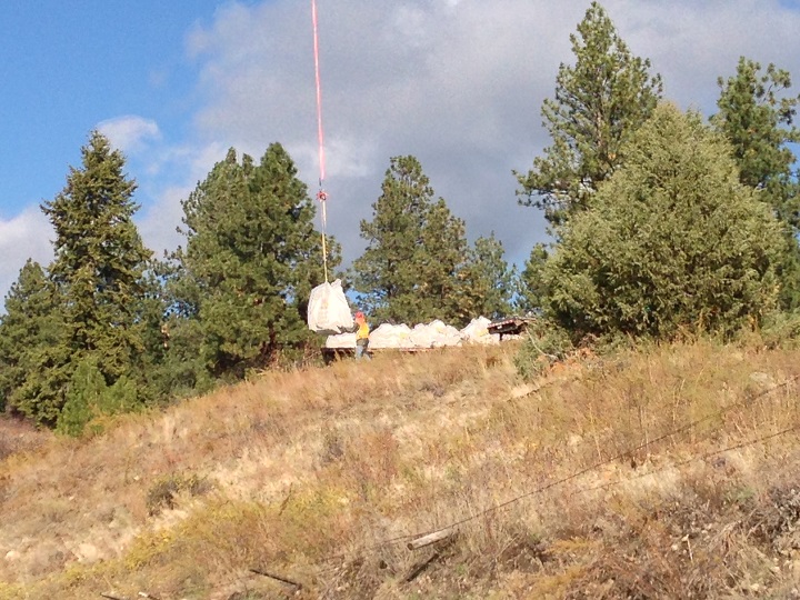 Crews are working on removing the wreckage of the plane on October 19, 2016.
