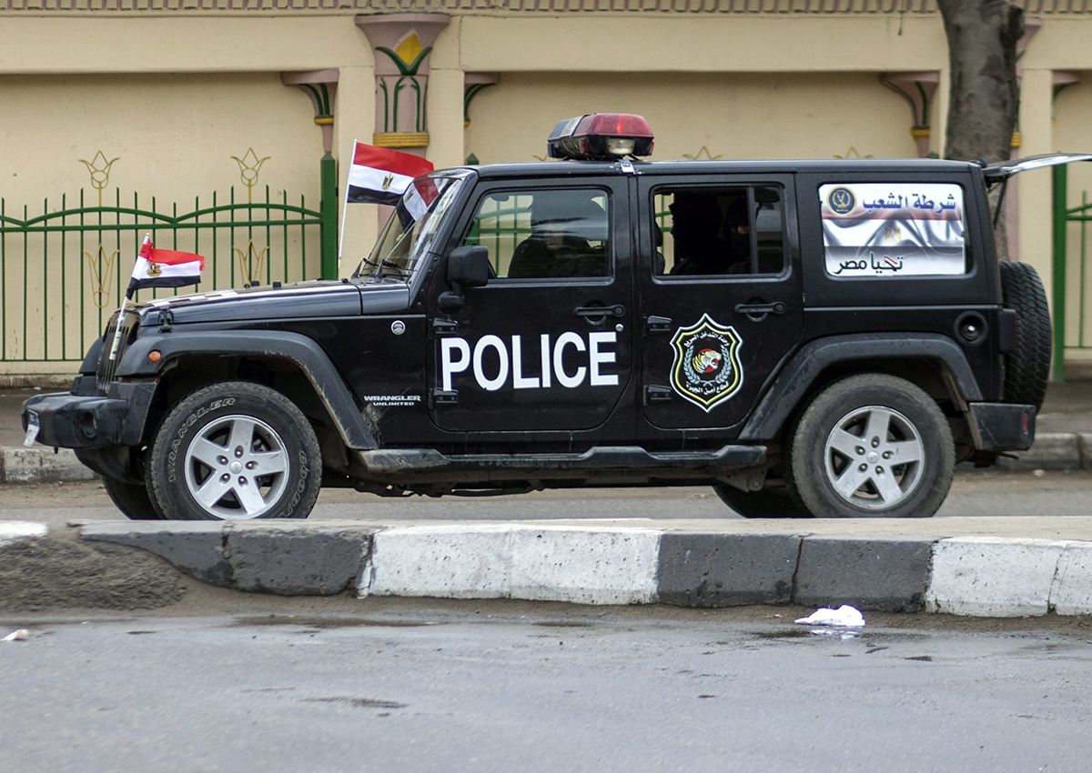 File: A police vehicle patrolling the streets, on the fifth anniversary of the 2011 uprising that ousted autocrat Hosni Mubarak, in the Haram district of Cairo, Egypt, Monday, Jan. 25, 2016. 