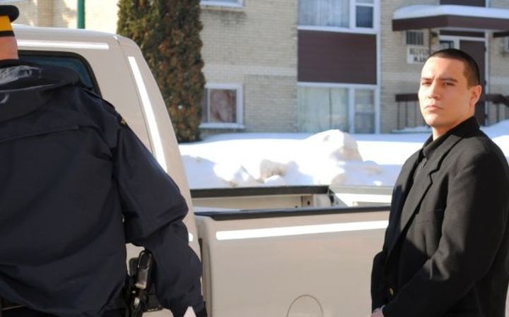 Lance Regan gets into an RCMP vehicle after his sentencing in 2011.