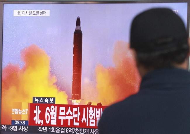 A man watches a TV news program showing a file image of a missile launch conducted by North Korea, at the Seoul Railway Station in Seoul, South Korea, Sunday, Oct. 16, 2016. South Korea and the U.S. said Sunday that the latest missile launch by North Korea ended in a failure after the projectile exploded soon after liftoff. The letters read "North attempted to fire a mid-range Musudan missile on June.