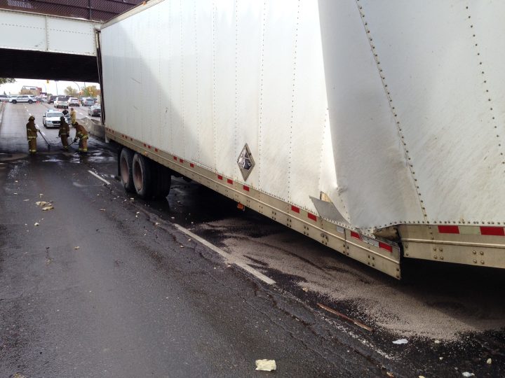 A semi truck was stuck under the Winnipeg Street underpass just north of Dewdney Avenue on Oct. 7.