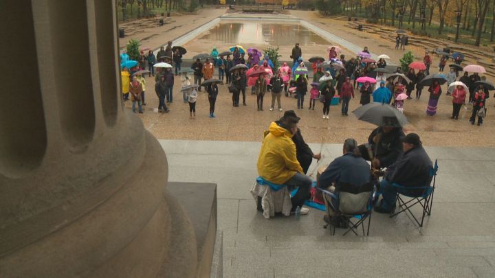 Dozens of people attended a sombre rally at the Alberta legislature Saturday afternoon to commemorate the lives of missing and murdered indigenous women. Oct. 1, 2016.