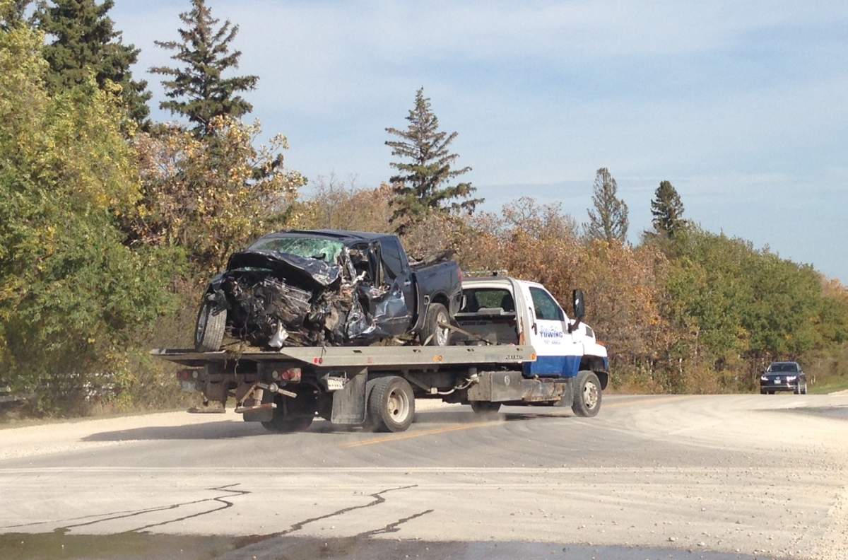 The truck Trent Milan was allegedly driving before a head-on collision with a semi being towed from the scene of the crash. 