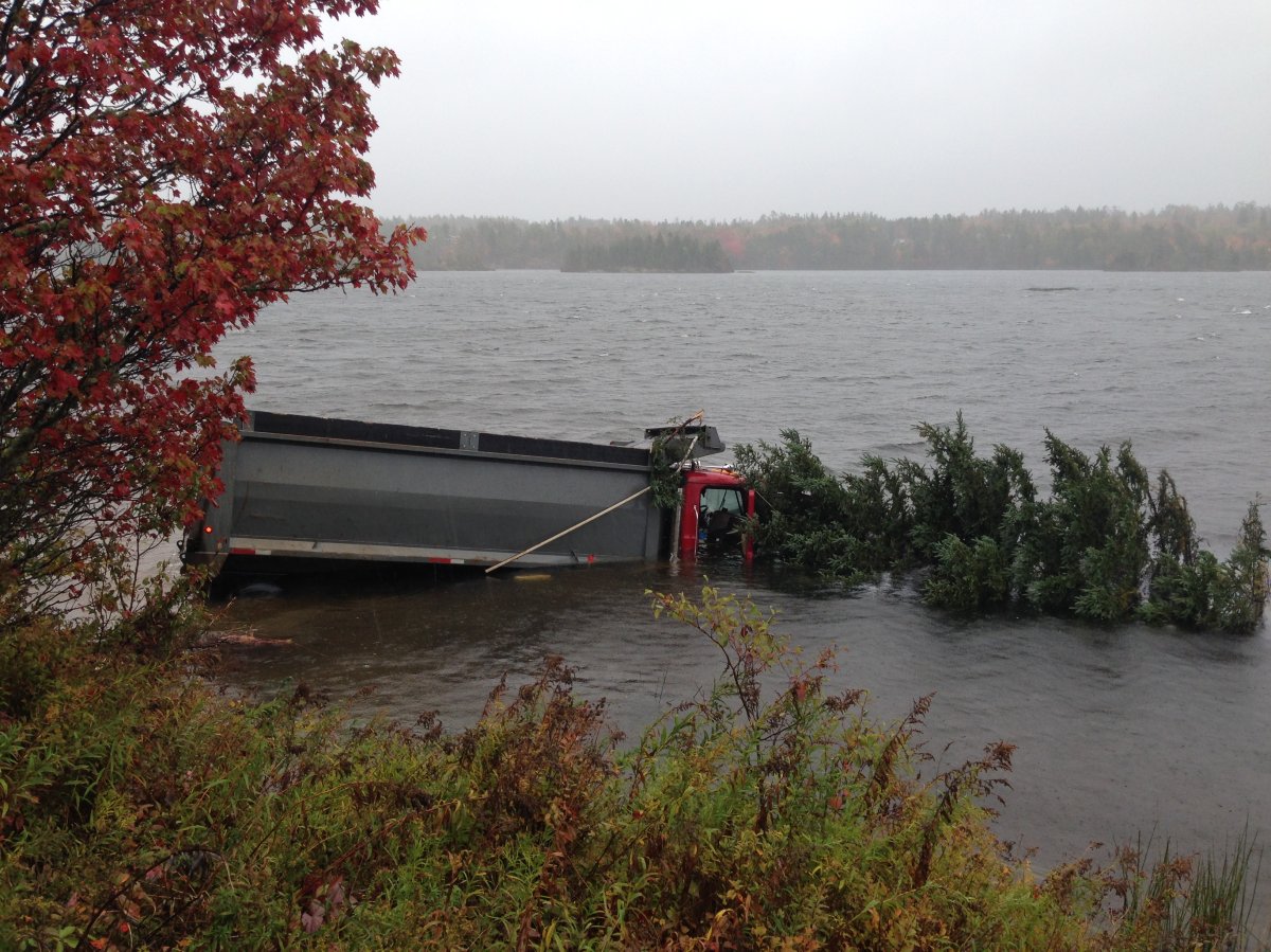 Driver escapes with minor injuries after crashing truck in Miller Lake near Fall River, NS.