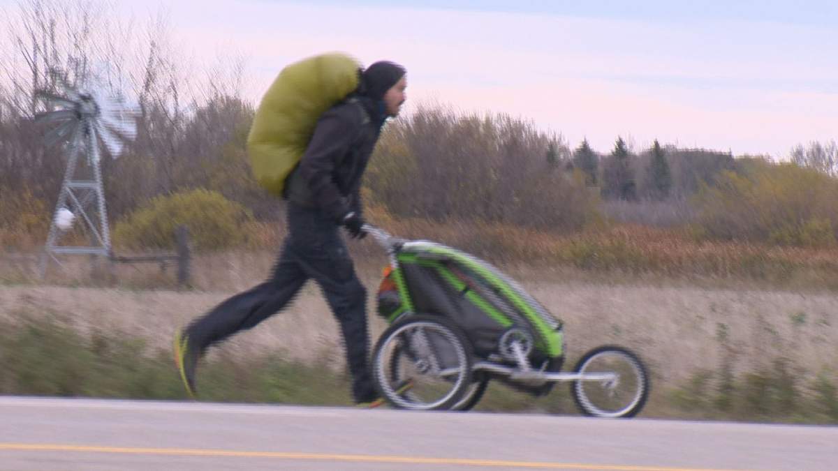 Dylan Gray running west towards Regina from Indian Head Sunday afternoon.