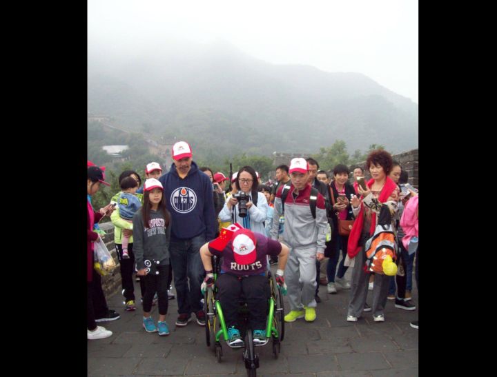 Kuen Tang wheeling the Great Wall of China.