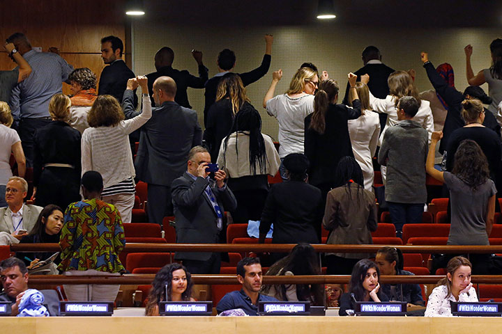 People turn their backs in protest in the gallery during an event for Wonder Woman to be named UN Honorary Ambassador for the Empowerment of Women and Girls at the United Nations Headquarters in the Manhattan borough of New York, New York, U.S., October 21, 2016.