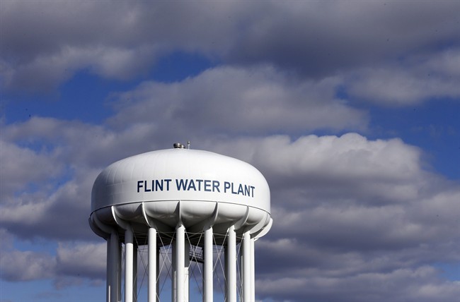 In this March 21, 2016 file photo, the Flint Water Plant water tower is seen. (AP Photo/Carlos Osorio, File).