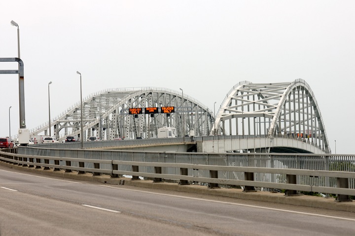 The Blue Water Bridge stands as the United States-Canada border crossing at Port Huron, Michigan and Sarnia, Ontario, July 1, 2013. THE CANADIAN PRESS IMAGES/Stephen C. Host.