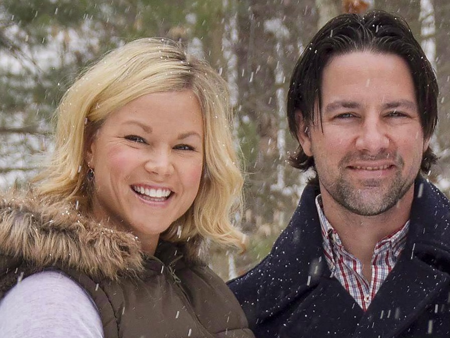 In this January 2014 photo, Thomas and Kelley Clayton pose in Caton, N.Y. Thomas Clayton, a former minor league hockey player has been charged with killing his wife in a murder-for-hire plot, authorities said.