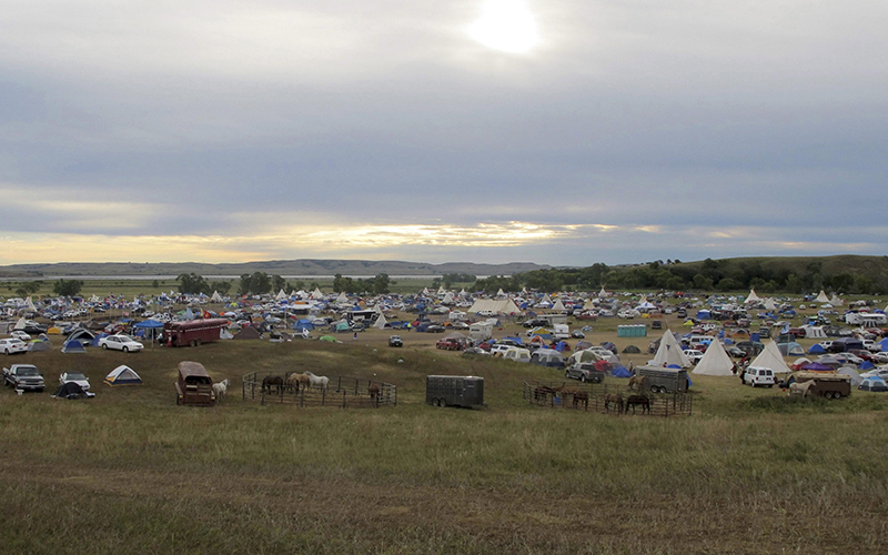 More than a thousand people gather at an encampment near North Dakota's Standing Rock Sioux reservation. 