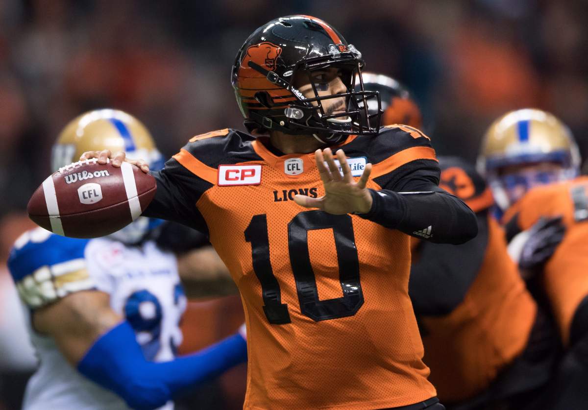 B.C. Lions quarterback Jonathon Jennings passes during first half western semifinal CFL football action against the Winnipeg Blue Bombers, in Vancouver on Sunday, November 13, 2016. 
