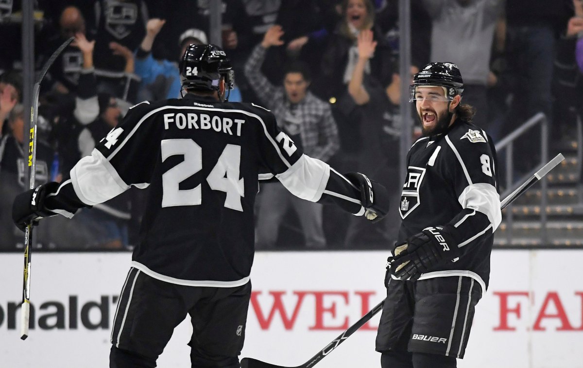 Los Angeles Kings defenseman Derek Forbort, left, celebrates his goal with defenseman Drew Doughty during the first period of an NHL hockey game against the Edmonton Oilers, Thursday, Nov. 17, 2016, in Los Angeles. 