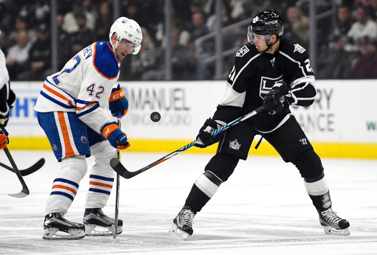 Edmonton Oilers left wing Anton Slepyshev, left, of Russia, and Los Angeles Kings right wing Marian Gaborik, of Slovakia, vie for the puck during the first period of an NHL hockey game, Thursday, Nov. 17, 2016, in Los Angeles. 