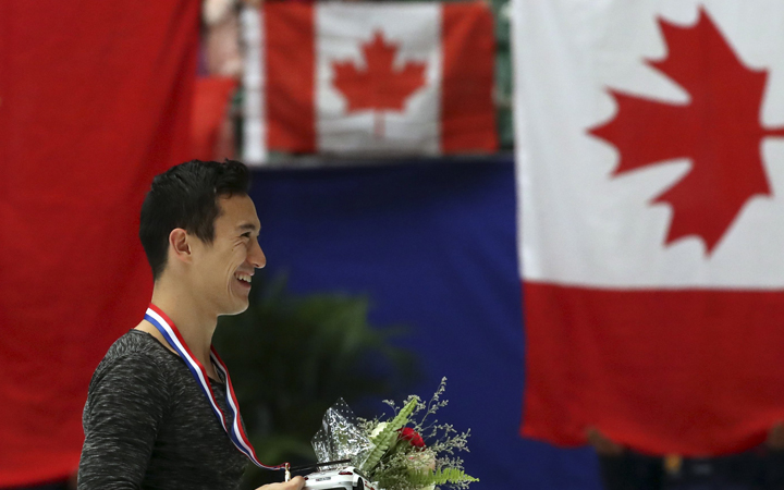 Winners of the Men category gold medalist Patrick Chan of Canada pose for photos at the Audi Cup of China ISU Grand Prix of Figure Skating 2016 held in the Capital Gymnasium in Beijing, China, Saturday, Nov. 19, 2016. 