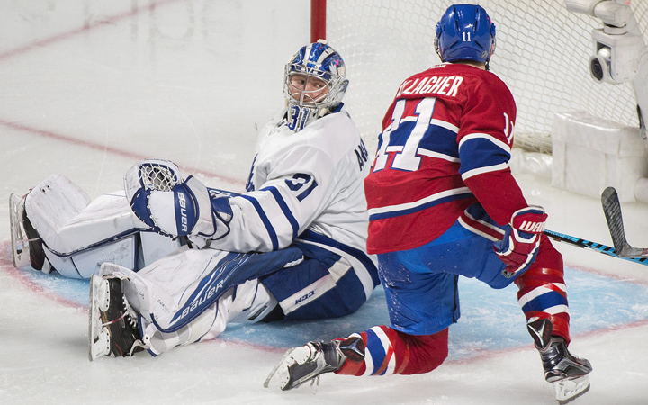 Toronto Maple Leafs goaltender Frederik Andersen looks back after being scored on by Montreal Canadiens' Alex Galchenyuk (not shown) as Canadiens' Brendan Gallagher looks for the rebound during second period NHL hockey action in Montreal, Saturday, November 19, 2016.